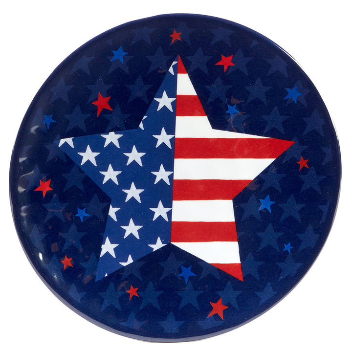 The Stars and Stripes 9in. Salad Plate displays a large central star, white stars on blue to the left, red and white stripes to the right, all on a dark blue background—an ideal patriotic accent for your table.