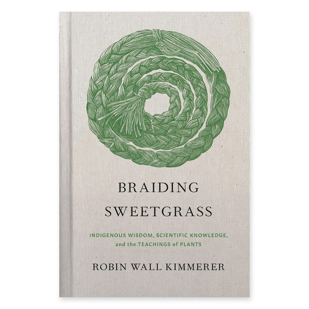 The cover of Braiding Sweetgrass: Indigenous Wisdom, Scientific Knowledge and the Teachings of Plants features a green braided spiral and displays the book’s full title by Robin Wall Kimmerer.