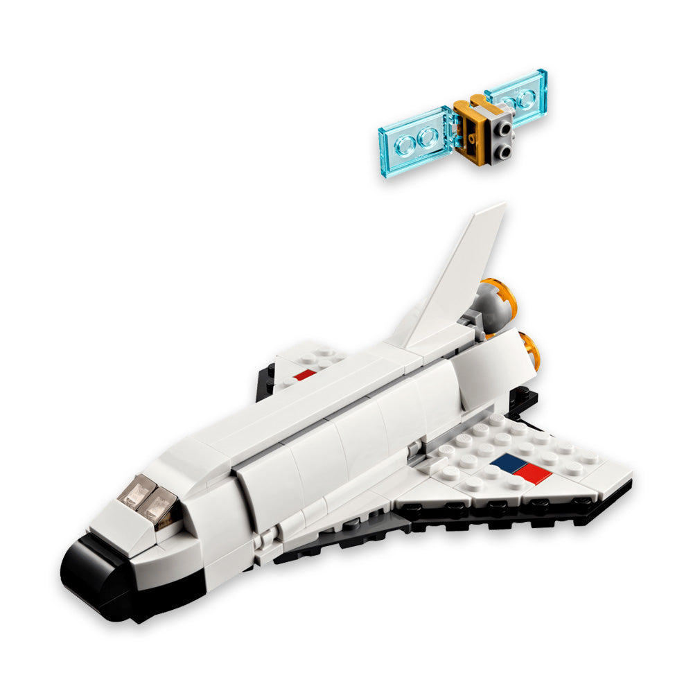 A LEGO Space Shuttle with black, white, and red details sits beneath a small LEGO satellite featuring blue solar panels on a plain white background. Ideal for space enthusiasts, the LEGO Space Shuttle is compatible with the LEGO Builder app for an interactive building experience.