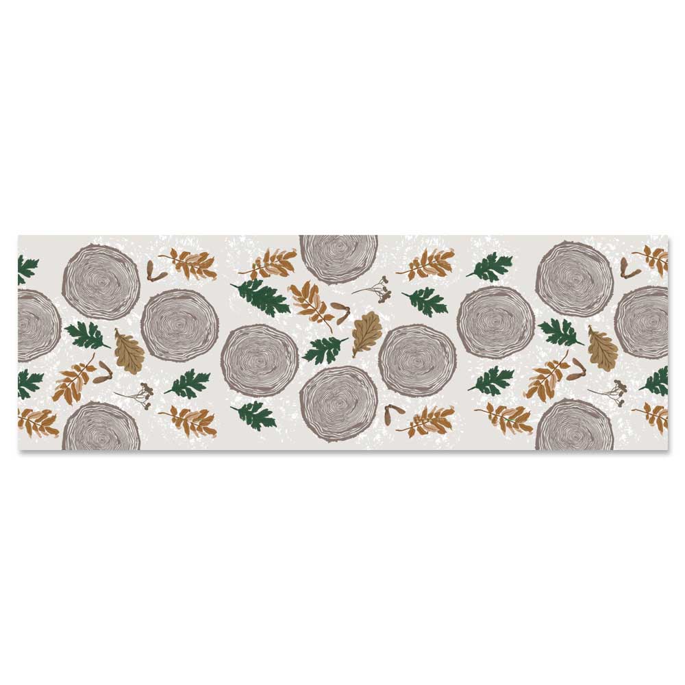 The Wood Tree Silky Scarf features a rectangular design with illustrated tree rings, green and brown leaves, and small branches on a light background—perfect as a lightweight nature-inspired accessory.