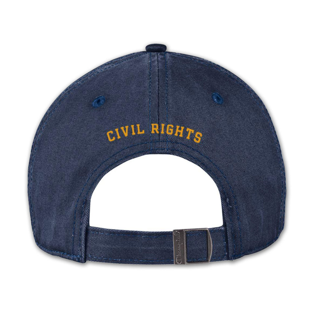 The 1964 Civil Rights Cap is a navy blue historical cap with "CIVIL RIGHTS" embroidered in yellow on the adjustable strap, secured with a metal clasp for comfort.