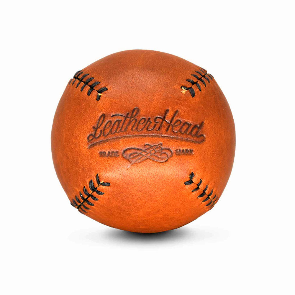The Lemon Ball Vintage Leather Baseball features black stitching and “Leather Head” and “Trade Mark” embossed on its surface, making it a standout collectible against a crisp white background.