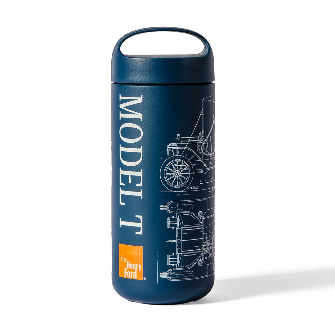 The Henry Ford® Model T Water Bottle in blue features a convenient handle, white blueprint-style illustrations of the iconic Model T car, bold MODEL T text, and an orange Henry Ford Museum logo.