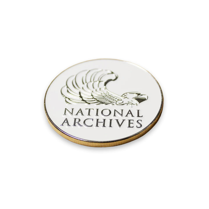 A collectible round coin featuring a stylized eagle and the text "Freedom Plane Tour Coin" on a white background—ideal for history enthusiasts or as a keepsake from your National Archives visit.