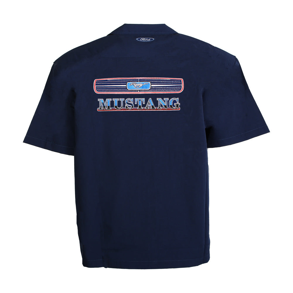 Show off your love for classic cars with the officially licensed Ford Mustang Pit Shirt. This navy blue short-sleeve shirt features a bold Mustang grille design and MUSTANG lettering on the back, complete with a small Ford logo above—perfect for any fan of the iconic muscle car.