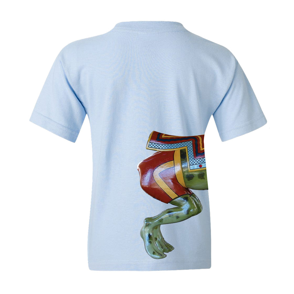 Light blue, 100% cotton youth t-shirt featuring a colorful partial frog graphic inspired by the Hershel the Frog Youth T-Shirt. This cartoonish frog, with green legs and a patterned, multicolored body reminiscent of those found near the Greenfield Village carousel, appears on the lower right back side of the shirt.