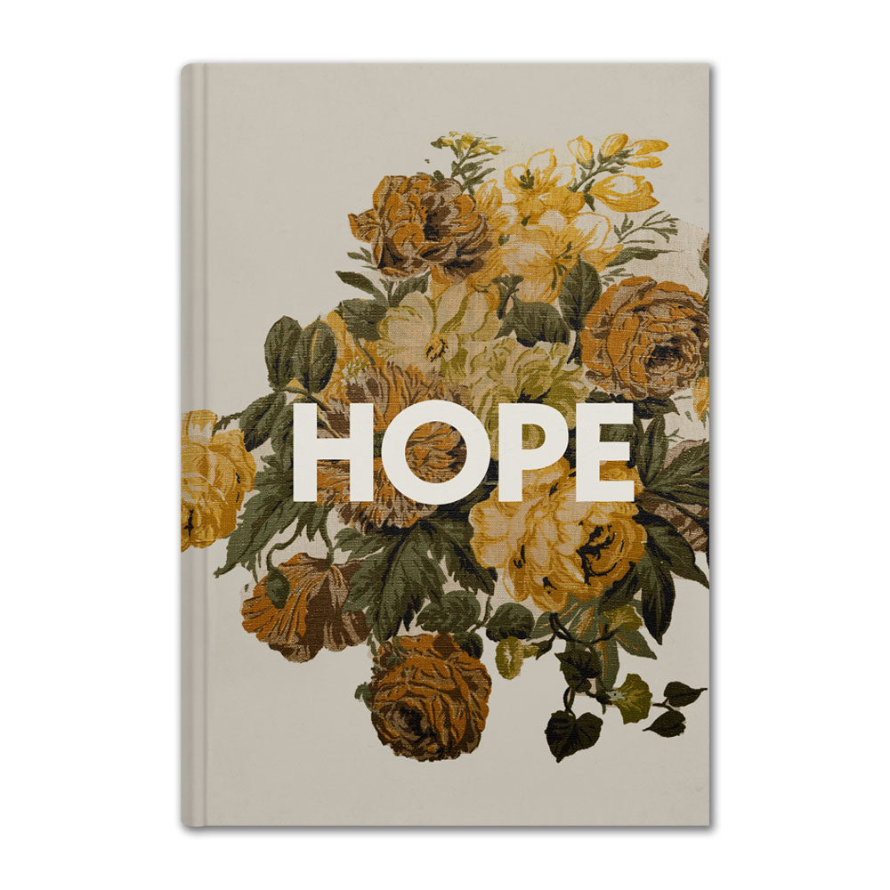 The Greenfield Village Jackson Home Hope Journal is a beige hardcover featuring vintage-style yellow and orange flowers, with "HOPE" boldly printed in white, evoking the classic elegance of a historic floral journal.