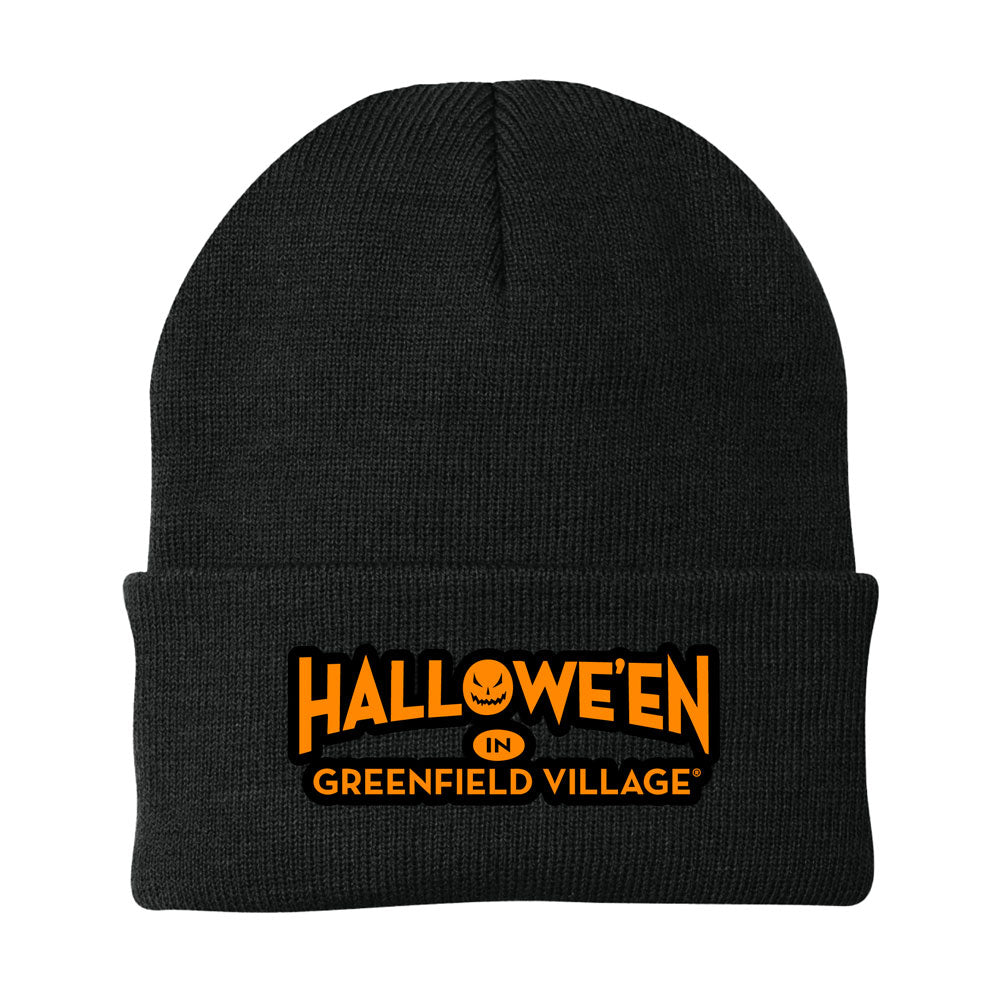 The Henry Ford® Greenfield Village Halloween Beanie is a black knit hat featuring “Halloween in Greenfield Village” in bold orange lettering across the front, with a whimsical jack-o-lantern face tucked into the “O” of Halloween. This cozy beanie is perfect for celebrating spooky nights at historic Greenfield Village.