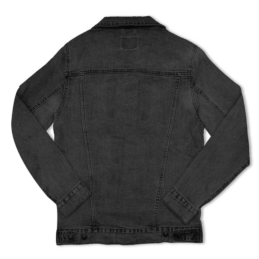 The Quilt Patches Denim Jacket is a women’s long sleeve denim jacket with seam detailing and buttoned cuffs, displayed from the back on a white background—classic style inspired by designs at the Henry Ford Museum.