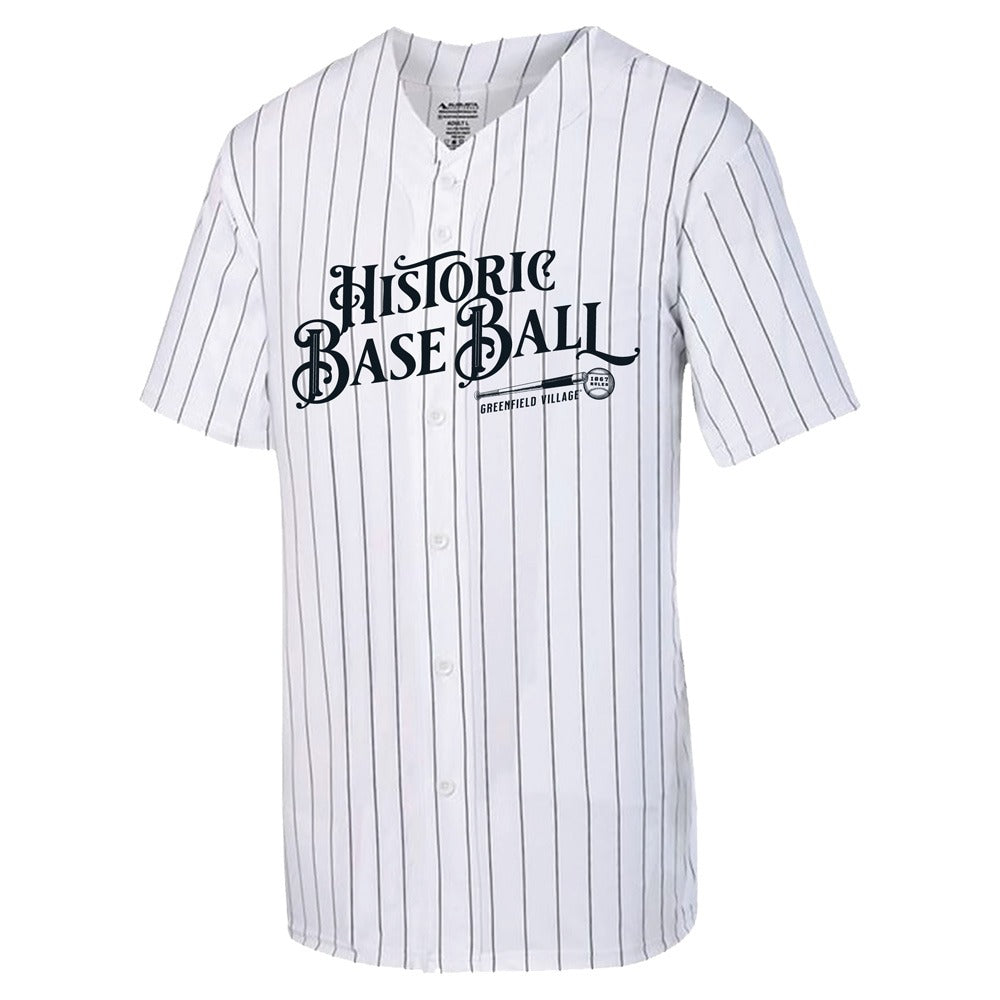 The Henry Ford® Historic Base Ball Jersey is a white button-up with thin black stripes and “Historic Base Ball Greenwood Village” in vintage lettering, inspired by classic uniforms.
