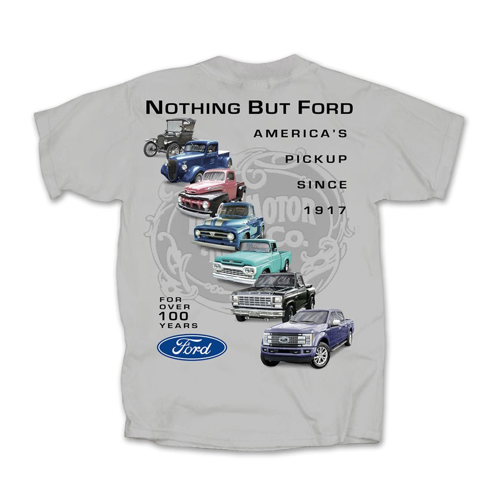 Wear your passion for classic American trucks with the Nothing But Ford Pickup T-Shirt. This shirt features a gray backdrop adorned with images of Ford pickup trucks spanning various eras, and showcases the text “Nothing But Ford, America’s Pickup Since 1917, For Over 100 Years,” finished with the iconic blue Ford logo at the hem—perfect for any dedicated Ford enthusiast.