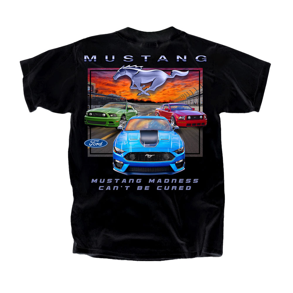 The Ford Mustang Madness T-Shirt is a black tee showcasing three Ford Mustang cars racing on a track, topped with a bold silver Mustang logo and the phrases MUSTANG and MUSTANG MADNESS CAN’T BE CURED in striking white letters—a must-have piece of apparel for fans who believe that Mustang Madness is truly unstoppable.