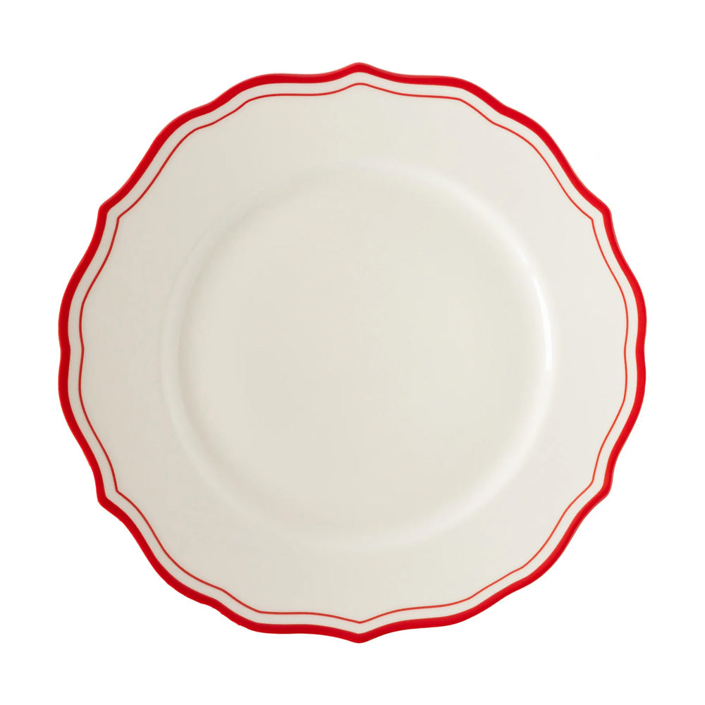 The Red Icing on the Cake Dinner Plate features a round shape, a white background, and a scalloped edge accented with a red double-lined border along the rim. Crafted from chip-resistant porcelain, it’s an ideal choice for your holiday dinnerware collection.