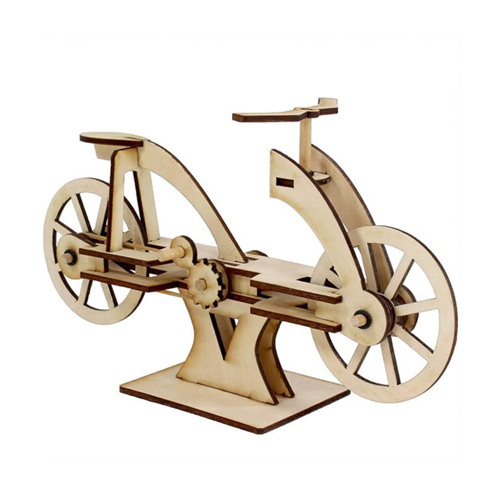 The Leonardo Da Vinci Mini Bicycle Kit is a wooden model with gears and a stand, made from laser-cut pieces and displayed on a plain white background.