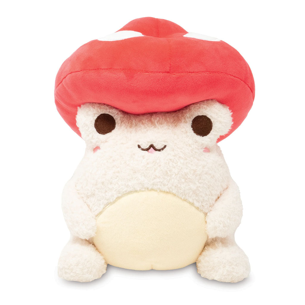 Wawa the Frog Wears a Mushroom Cap Plush features a cute frog in a soft, fluffy plush design, topped with a large red mushroom cap, big round eyes, a smiling mouth, small arms and legs, and a cream-colored belly.