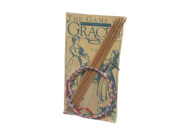 The Game of Graces Historic Game includes a brightly colored ring, four wooden sticks, and an illustrated instruction sheet, inspired by classic American games of the 18th and 19th centuries.