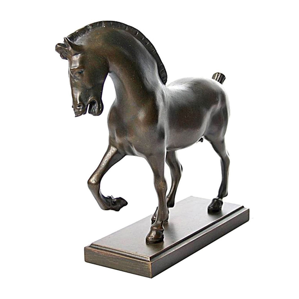 The Da Vinci Bronze Horse Figure features a horse on a rectangular base, with one front leg raised and its head slightly turned, embodying the movement and elegance of Renaissance sculpture.