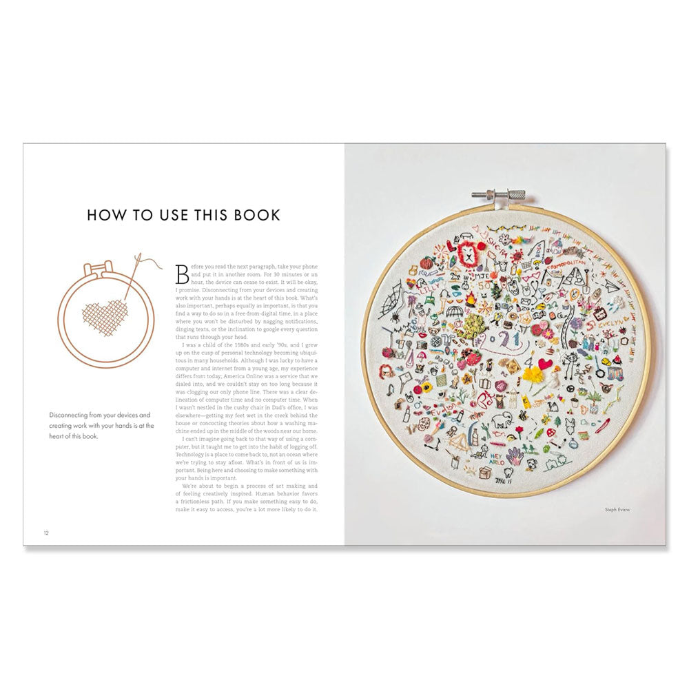 An open book, "Threads of Treasure: How to Make, Mend, and Find Meaning through Thread," displays usage instructions with heart embroidery on the left and a hoop full of colorful modern stitched designs on the right for creative inspiration.