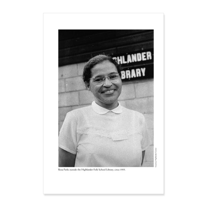 Black-and-white photo of Rosa Parks smiling before a building with a sign for Highlander Folk School Library. Her early civil rights activism, seen here, is explored in The Rebellious Life of Mrs. Rosa Parks.