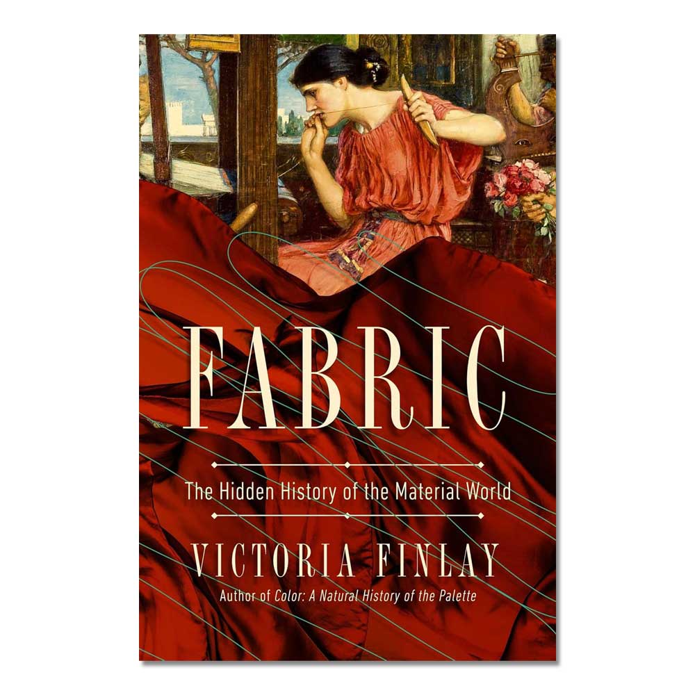 Book cover for "Fabric: The Hidden History of the Material World" shows a woman in a red dress sewing against vibrant red fabric, reflecting the rich history and stories woven into textiles.