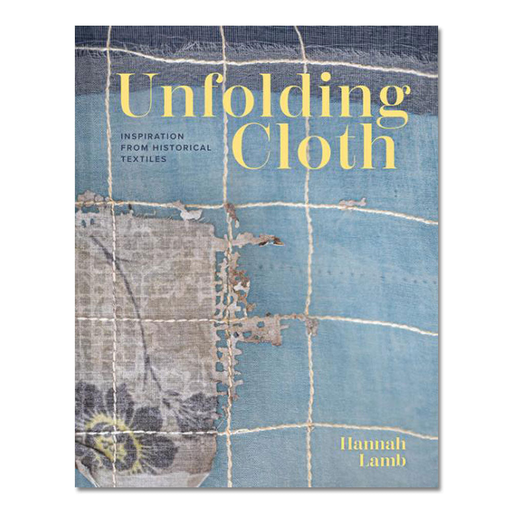 Book cover of Unfolding Cloth: Inspiration from Historical Textiles features a blue textile background with grid lines and distressed textures, drawing inspiration from vintage fabrics and textile art.