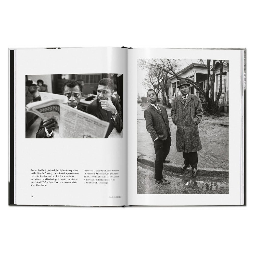 James Baldwin. Steve Schapiro. The Fire Next Time is open to two black-and-white photos of Black men in coats and hats, evoking the civil rights era as they read and reflect on rain-soaked streets.