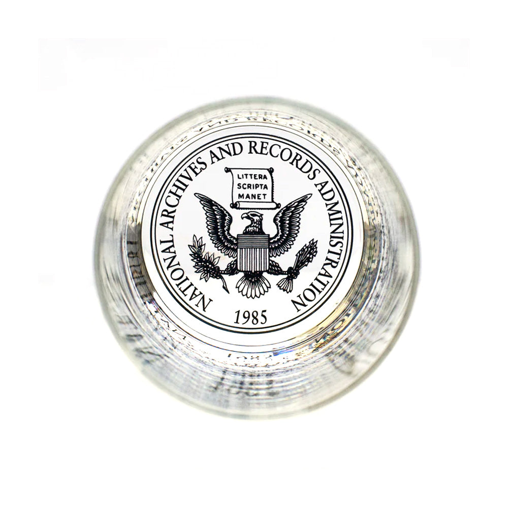The Declaration of Independence Rocks Glass makes a fitting companion to your glass collection, especially when paired with a National Archives eagle logo paperweight featuring a bald eagle, laurel branches, “Littera Scripta Manet,” and “1985.”.