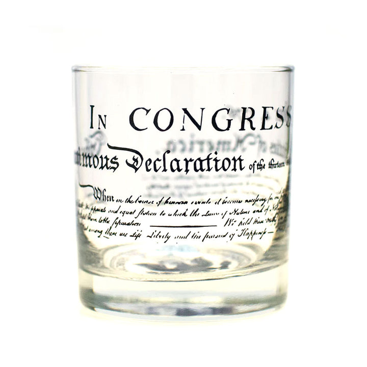 The U.S. Constitution Rocks Glass showcases black printed text replicating a portion of the historic document, featuring phrases from the U.S. Constitution.