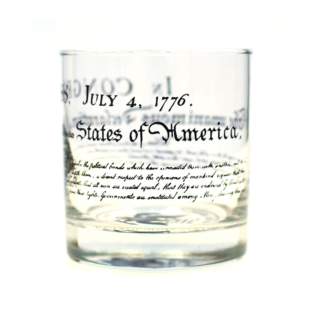 The U.S. Constitution Rocks Glass features black script text from the historic document, including "We the People," with additional lines below—a unique tribute for any history lover.