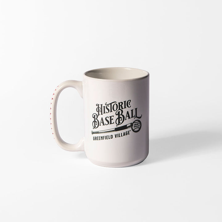 The Greenfield Village Base Ball Club Mug features "Historic Base Ball, Greenfield Village" in black vintage-style text on the front. This ceramic mug is shown against a plain white background.