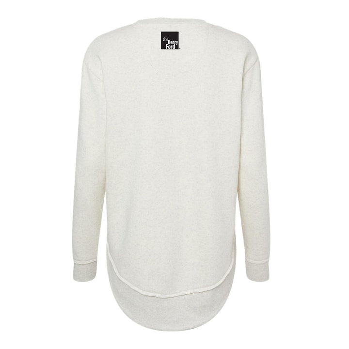 A plain, long-sleeved, off-white women's crewneck sweatshirt is shown from the back. The rounded hem and black neck label reading “The Ivory Fern” identify it as The Henry Ford Museum Rosie The Riveter Women's Sweatshirt.