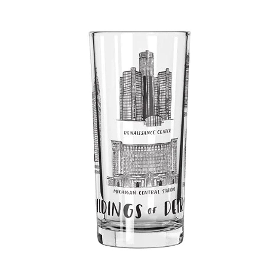 The Buildings of Detroit 12oz Glass features black illustrations and labels of iconic Detroit buildings, like the Renaissance Center and Michigan Central Station, with "Buildings of Det..." printed at the bottom.
