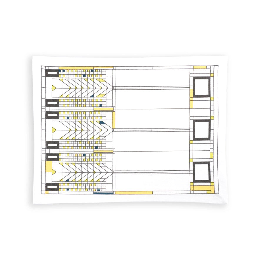 The Frank Lloyd Wright Tree of Life Placemat features a geometric architectural design with black, yellow, and blue lines and rectangles, inspired by modern building blueprints.