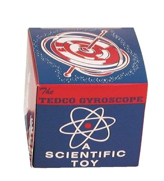 A blue, red, and white box labeled Toy Gyroscope features an illustration of a spinning gyroscope and an atomic symbol on the front.