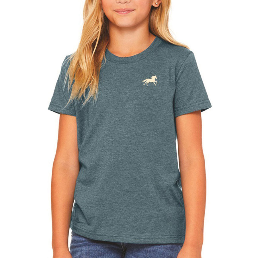 A young person wears the Youth Greenfield Village Wild at Heart T-Shirt, featuring an embroidered horse graphic on the upper left chest, and stands against a plain background.