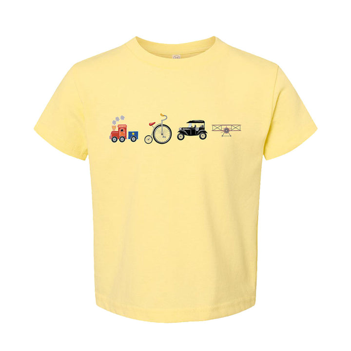 The Greenfield Village Icons Toddler T-Shirt is a yellow tee featuring charming illustrations of a train, penny-farthing bicycle, vintage car, and biplane—ideal for young fans of Greenfield Village.