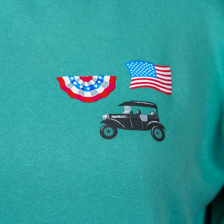 The Greenfield Village Model T Women's Sweatshirt in teal features an American flag, red, white, and blue patriotic bunting, and a black vintage Model T car inspired by Greenfield Village.