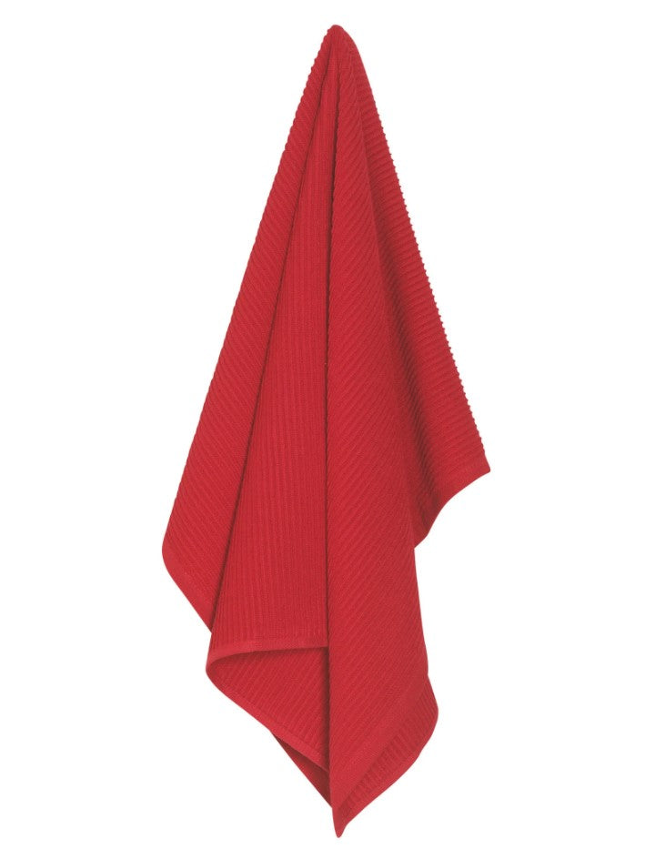 The Ripple Red Dishtowel - Single, known for its high absorbency, hangs against a white background with its textured ends draping downward.