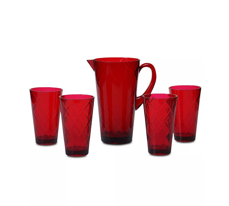 A Radiant Ruby 2.25 qt. acrylic pitcher with handle and four matching red, faceted tumblers—all transparent and dishwasher safe—are arranged on a white background.
