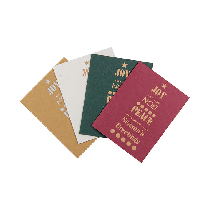 The Contemporary Holiday Gift Card Set includes four cards in brown, white, green, and red, each displaying gold-embossed festive words—JOY, NOEL, PEACE, and Season’s Greetings—in a tree-shaped design.