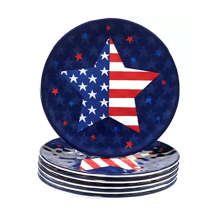 The Stars and Stripes 9in. Salad Plate features a large white star with an American flag design on a dark blue background with red and blue stars—perfect patriotic dinnerware for any Stars & Stripes themed gathering.