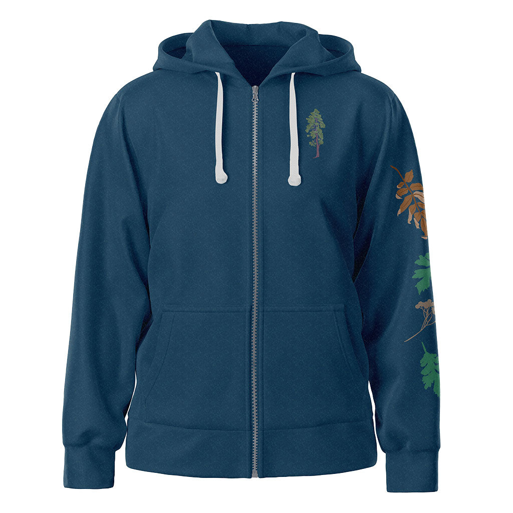 The Wood Tree Zip-Up Hooded Sweatshirt in navy blue features white drawstrings, tree art on the left chest, and botanical designs on the right sleeve. Responsibly made for comfort and style.